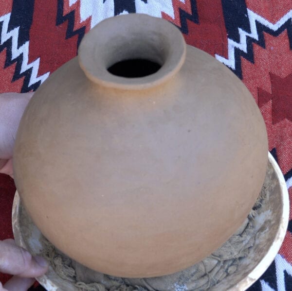 Each pot has been constructed with native clays